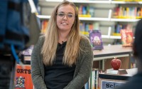Lindsey Wilson, a teacher at Bennington Middle School, talks to reporters after being selected as the 2025 Nebraska Teacher of the Year, Sept. 19, 2024. 
(Zach Wendling / Nebraska Examiner) 