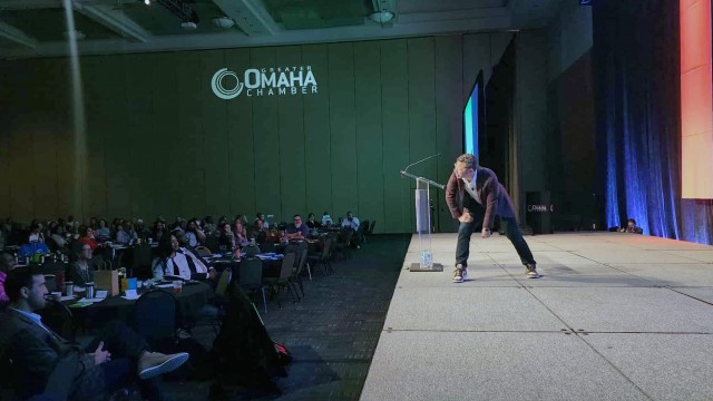 Adam “Smiley” Poswolsky gets animated as he discusses the need for people to feel included in order to succeed in today’s business climate at the Omaha Chamber’s POWER Conference at CHI Health Center in Omaha on October 10, 2025.
(Tim Trudell / The Daily Record)