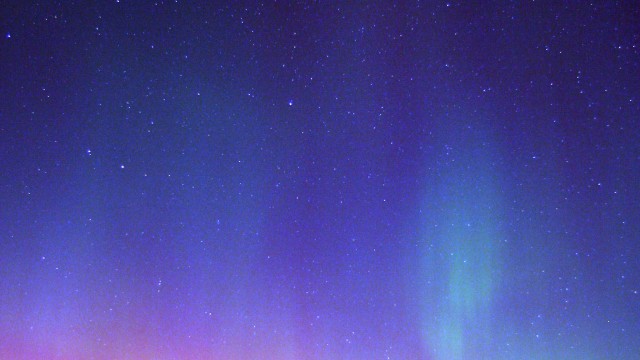 The aurora borealis lights up the night sky north of Dunkerton, Iowa, Sunday night, Nov. 7, 2004.
(Brandon Pollock / Waterloo Courier / AP Photo)