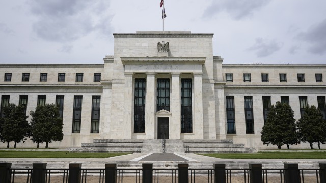 An American flag flies over the Federal Reserve building on May 4, 2021, in Washington. (Patrick Semansky / AP Photo)
