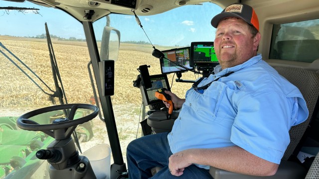 Kentucky Farmer Caleb Ragland sits in his combine while harvesting corn in Magnolia, Ky., Sept. 12, 2025. 
(Dylan Lovan / AP Photo)