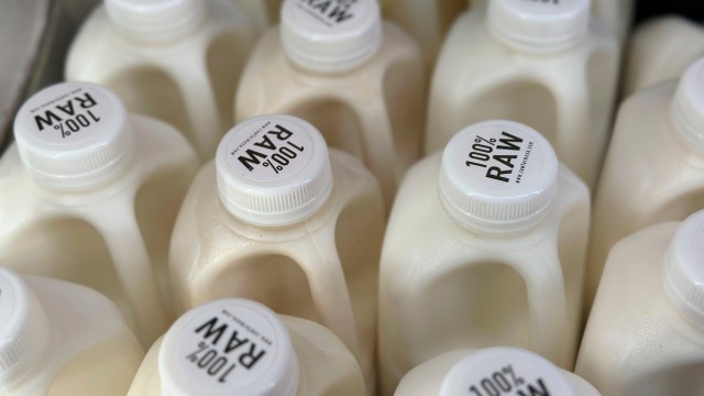 Bottles of raw milk are displayed for sale at a store in Temecula, Calif., on Wednesday, May 8, 2024. 
(JoNel Aleccia / AP Photo)