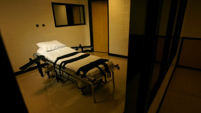 The gurney used for lethal injections sits behind glass windows in a small cinder block building at the Georgia Diagnostic and Classification Prison in Jackson, Ga., Sept. 7, 2007.
(Ben Gray / Atlanta Journal-Constitution via AP)