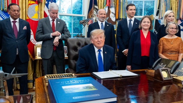 President Donald Trump winks as the members of the media depart the Oval Office of the White House as Essar Capital Director Prashant Ruia, from left: Energy Secretary Chris Wright, Commerce Secretary Howard Lutnick, John Jovanovic, chairman of the Export-Import Bank of the United States, Iowa Attorney General Brenna Bird, Mariannette Miller-Meeks, R-Iowa., and Rep. Ashley Hinson, R-Iowa, look on, Monday, Sept. 28, 2026, in Washington. 
(Alex Brandon / AP Photo)