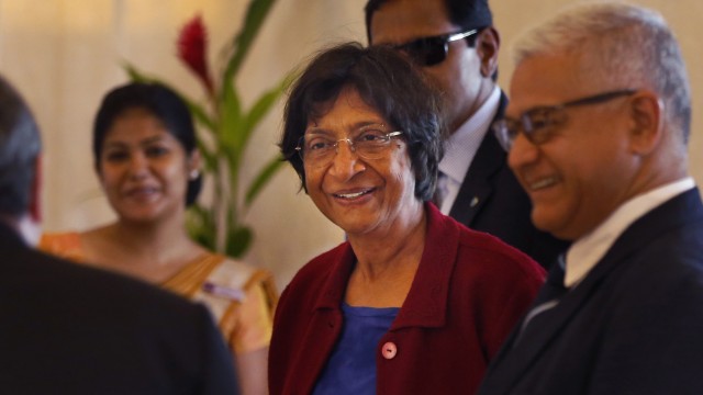 U.N. High Commissioner for Human Rights Navi Pillay (center) arrives at a hotel in Colombo, Sri Lanka, Sunday, Aug. 25, 2013.
(Eranga Jayawardena / AP Photo)