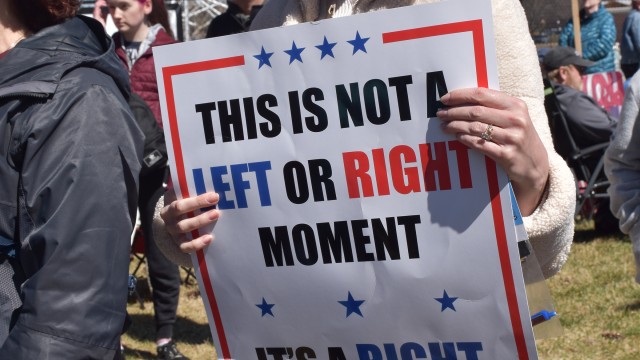 Citizens, exercising their civil liberties, display their patriotism during various rallies held throughout the metro area.
(Carla Chance / The Daily Record)