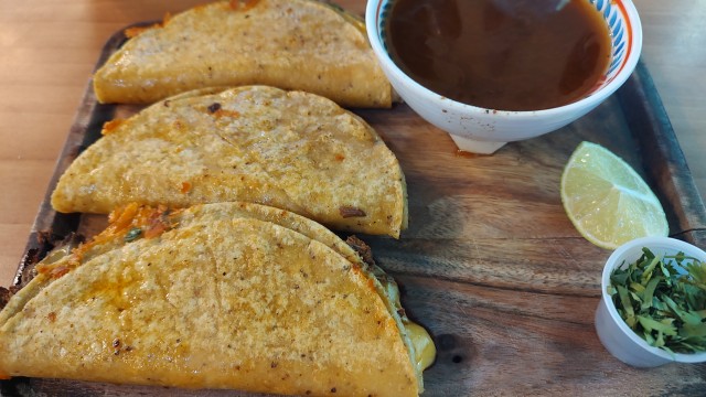 The Fabulous quesa-birria! Made from a secret family recipe. There is of course the broth which is to be used to dip the taco in, as well as the lime (which should absolutely be used in the taco and in the broth!)
(Austin Petak / The Daily Record)