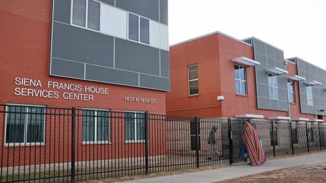 The Siena Francis House has grown from a singled facility to a six-building complex in recent years in an attempt to address Omaha’s unhoused issue. 
(Tim Trudell / The Daily Record)