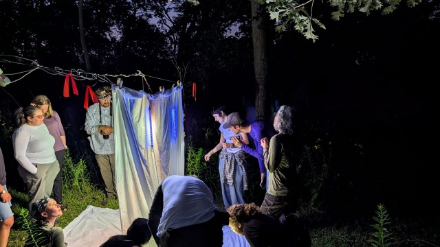 A hanging bedsheet lit with different spectrums of light, attracting many-hudnreds of species of bugs, waiting to be counted and catolouged by the volunteer team at Fontenelle Forest’s Insect Survey: Night Trapping event on July 11, 2026 in Bellevue, Nebraska.
(Courtesy of Michelle Foss)