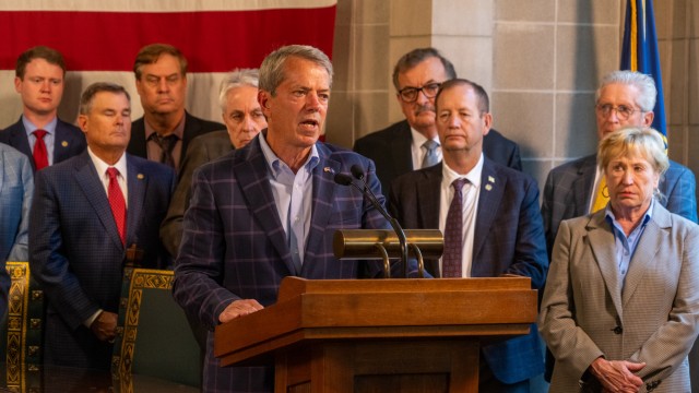 Gov. Jim Pillen hosts a news conference at the end of the Legislature’s special session to address property taxes that begin almost one month prior. To his far left is State Sen. Lou Ann Linehan of the Elkhorn area, chair of the Legislature’s Revenue Committee, Aug. 20, 2024.
(Zach Wendling / Nebraska Examiner)