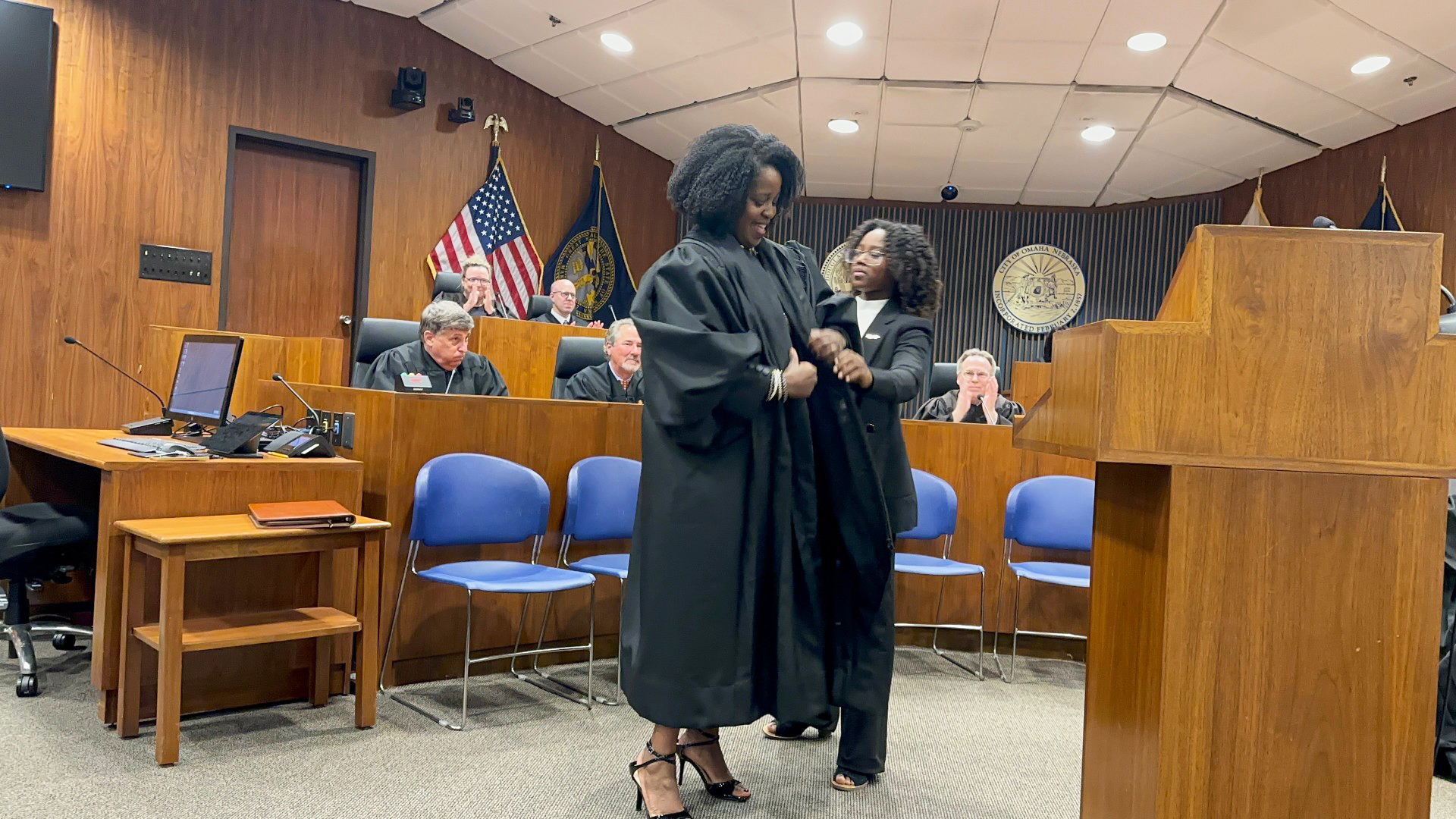 The Honorable Tamara T. Mosby, helped into her robe for the first time by her daughter Brooklyn Montegut.<br />(Courtesy of Dr. Montegut)