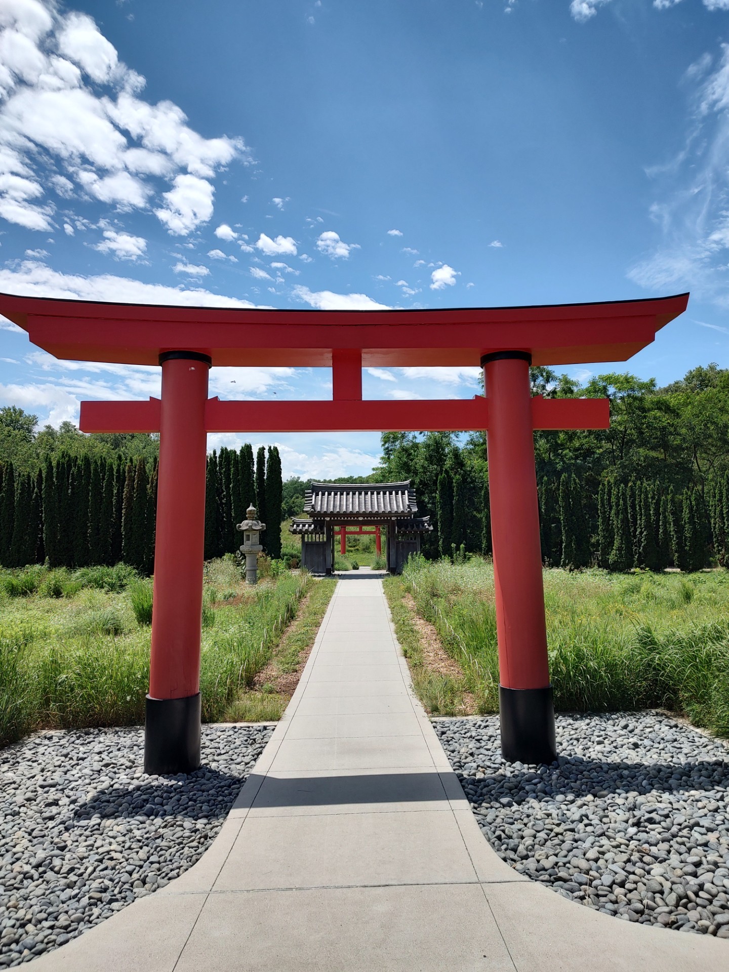 A traditional Shinto Torii gate: a doorway between the mundane and the sacred, demarcating a Japanese garden.<br />(Austin Petak / The Daily Record)