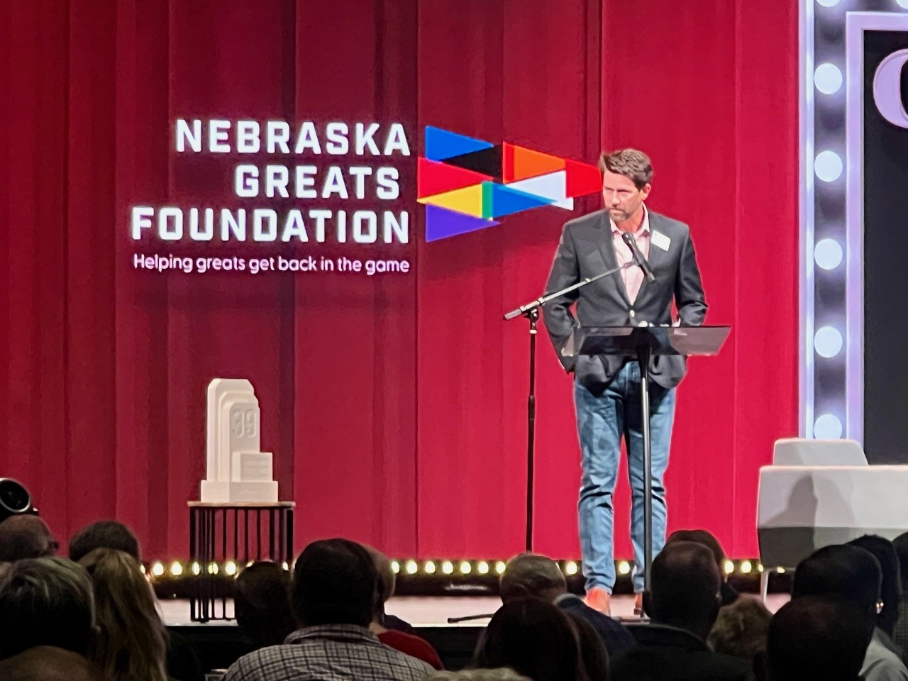 Eric Crouch speaks after receiving the 2024 Andra Franklin Service Award for philanthropy in Nebraska.<br />(Derek Noehren / The Daily Record)